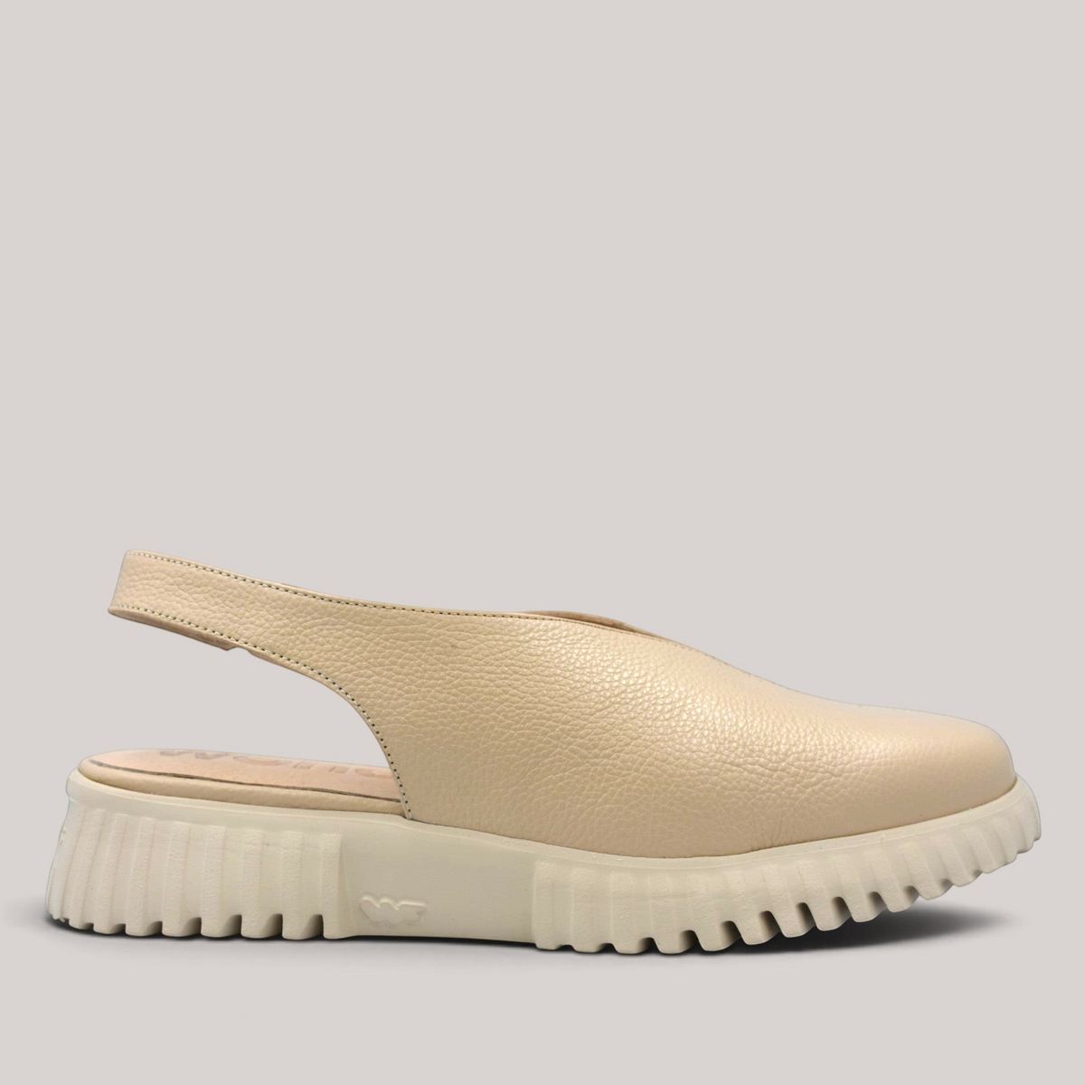 Grundy's Shoes Wonders 4411 beige leather slingback shoes with a lightweight platform sole and open back design.