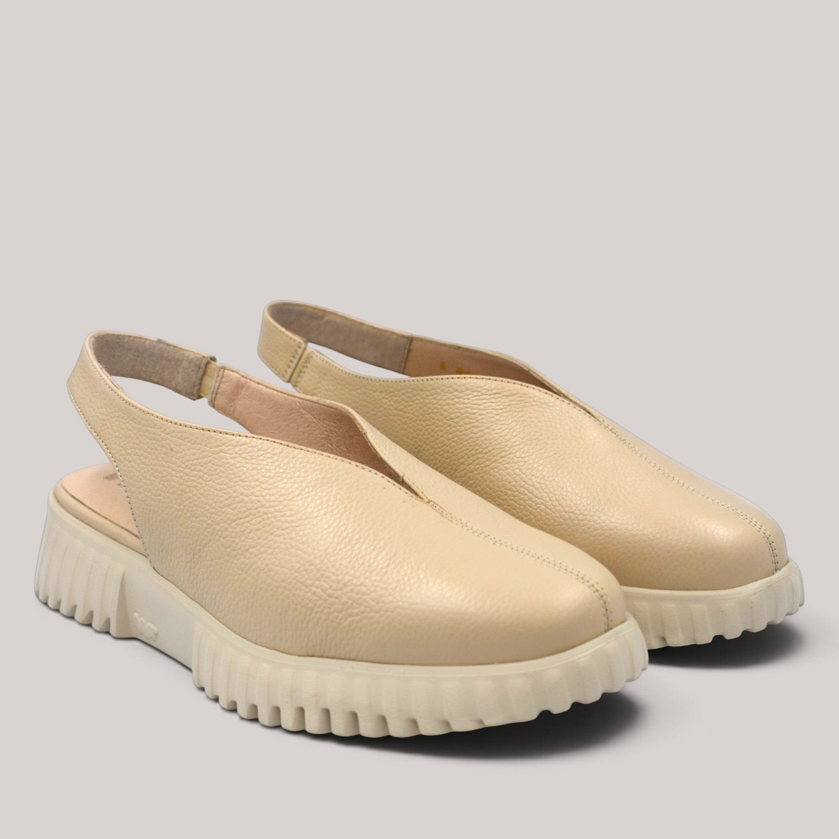 Grundy's Shoes Wonders 4411 beige leather slingback shoes with a lightweight platform sole and adjustable strap.
