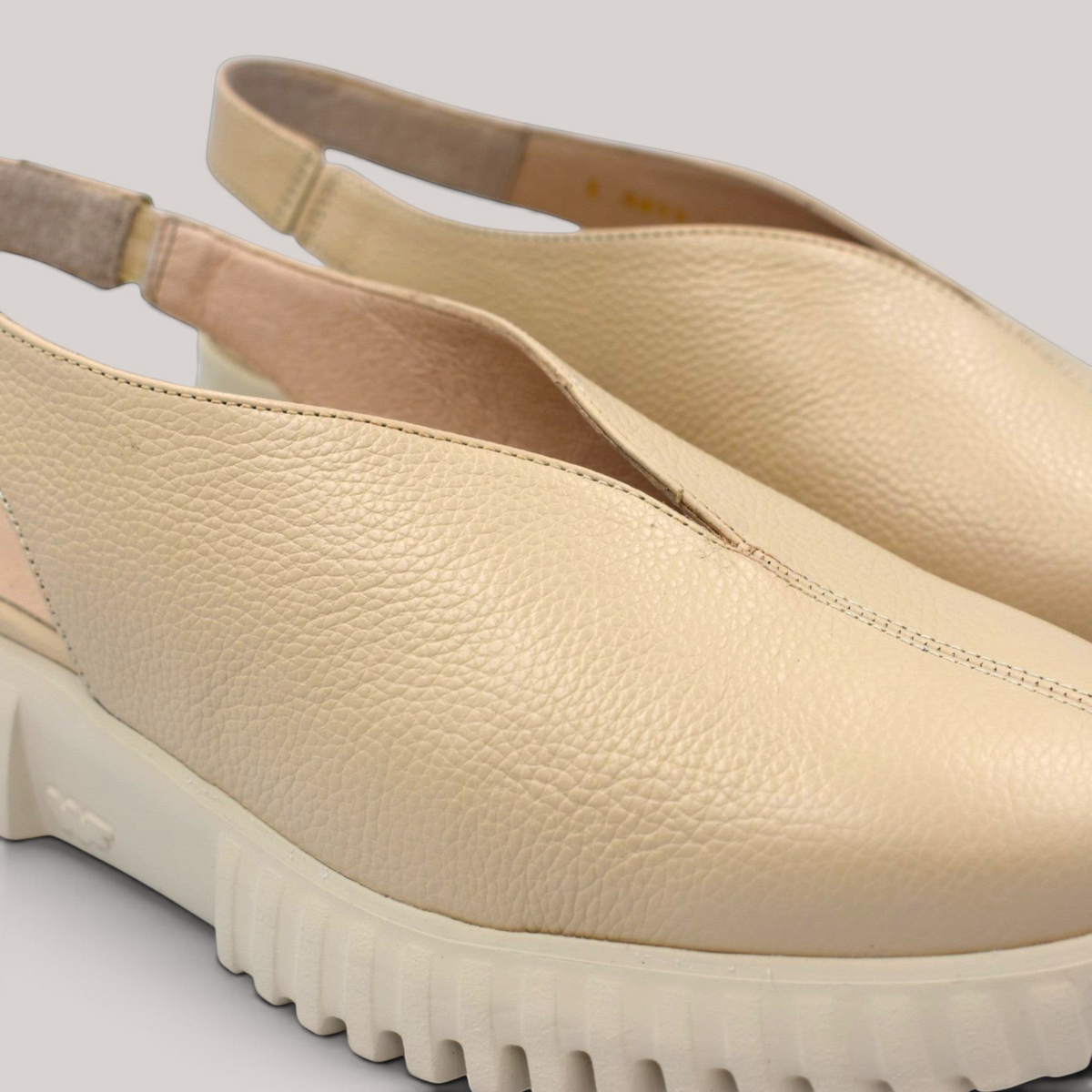 Grundy's Shoes Wonders 4411 beige leather slingback shoes with a lightweight platform sole and adjustable strap.