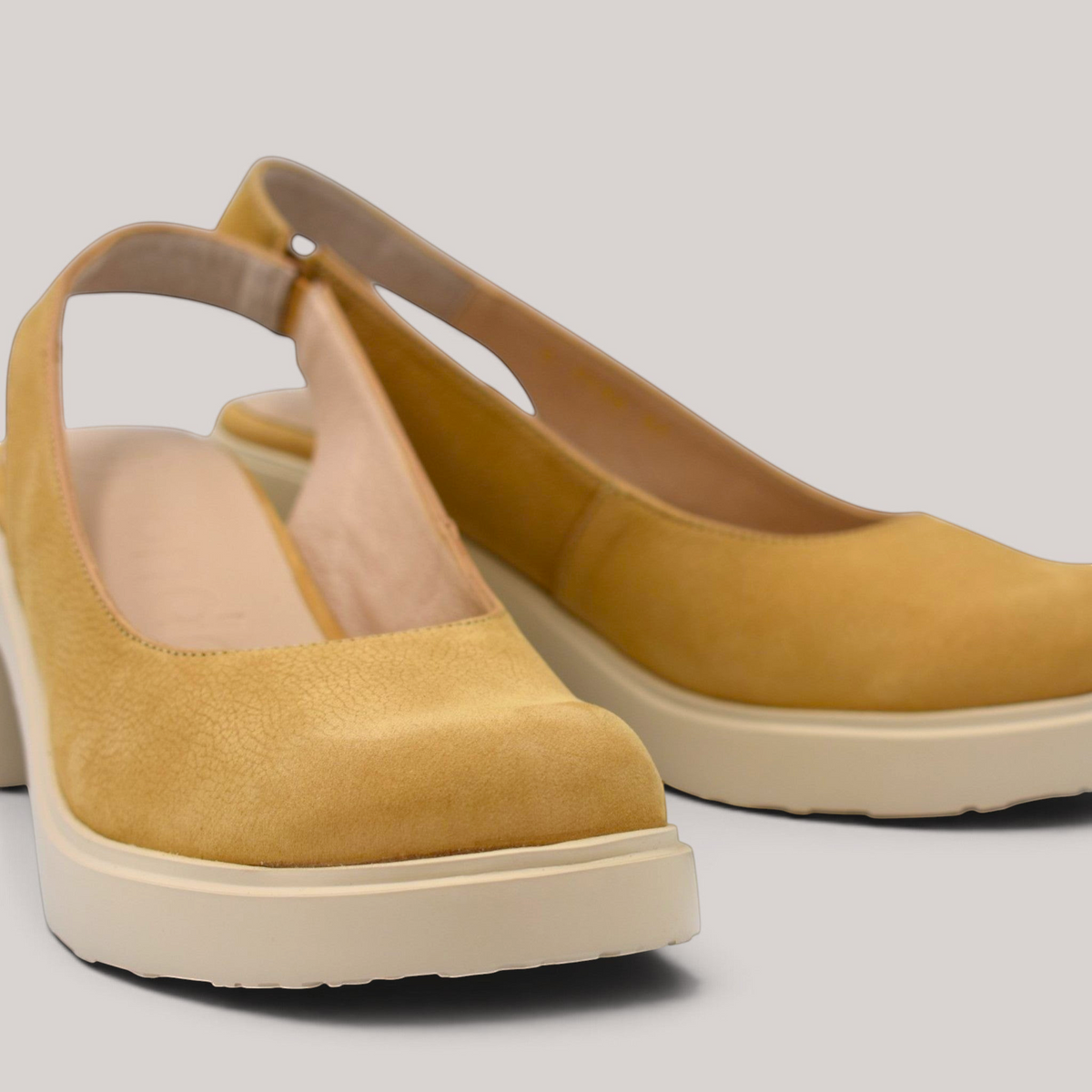 Grundy's Shoes Wonders 7132 tan nubuk leather slingback shoes with a lightweight platform sole and elastic strap.