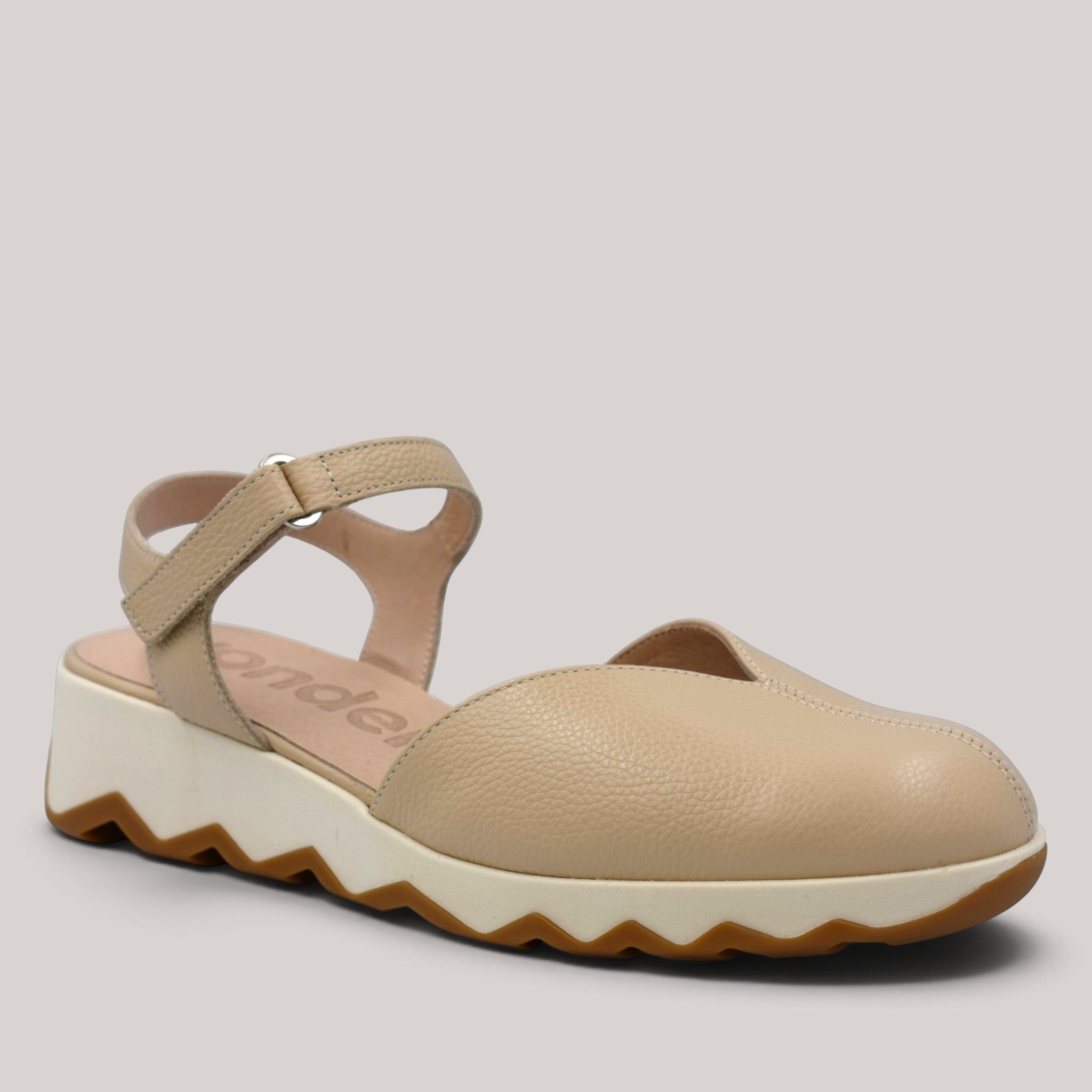 Grundy's Shoes Wonders 7601 beige leather slingback sandal with a cushioned white EvoLight platform sole.