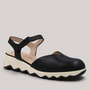 Grundy's Shoes Wonders 7601 black leather slingback shoe with a white cushioned EvoLight sole and side buckle.