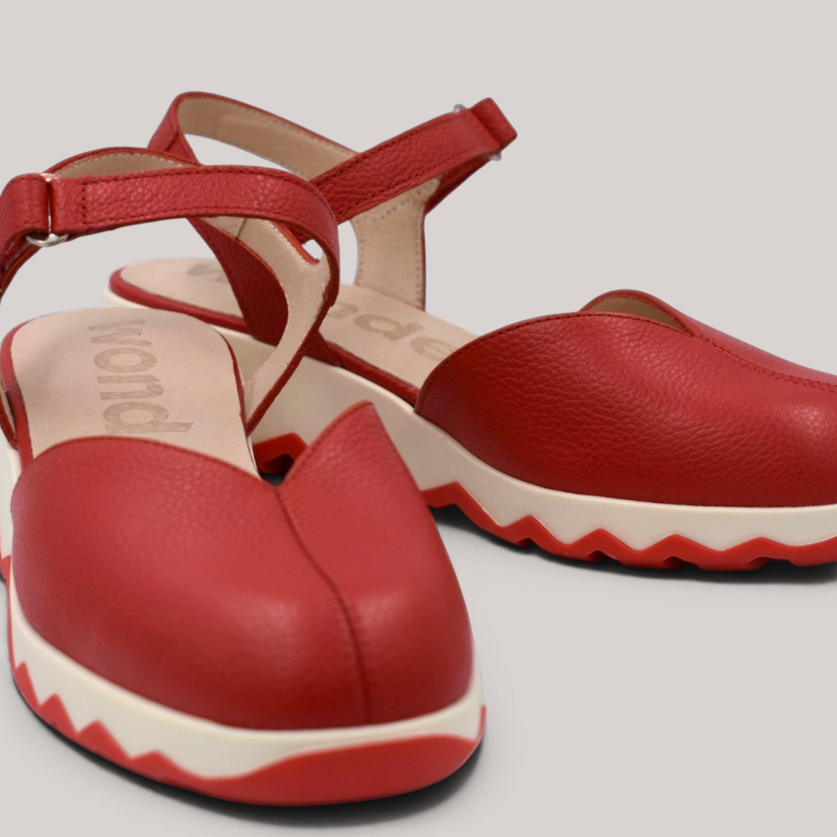 Grundy's Shoes Wonders 7601 red leather slingback shoes with a cushioned white and red platform sole.