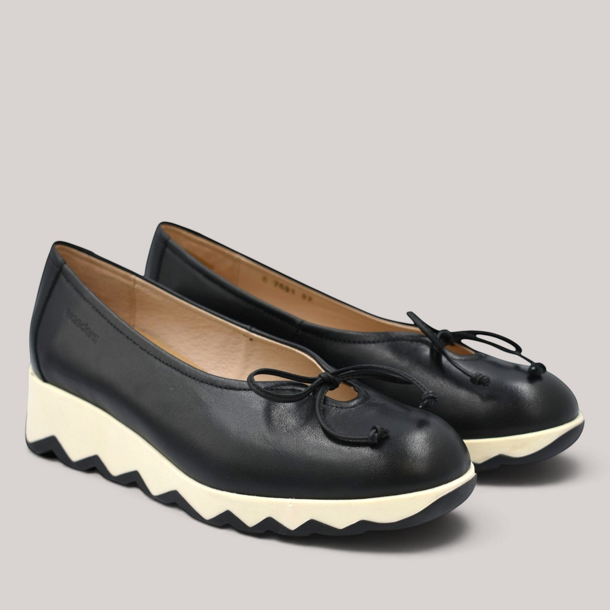 Grundy's Shoes Wonders 7621 black leather ballet wedge shoes with a signature bow and white slip-resistant sole