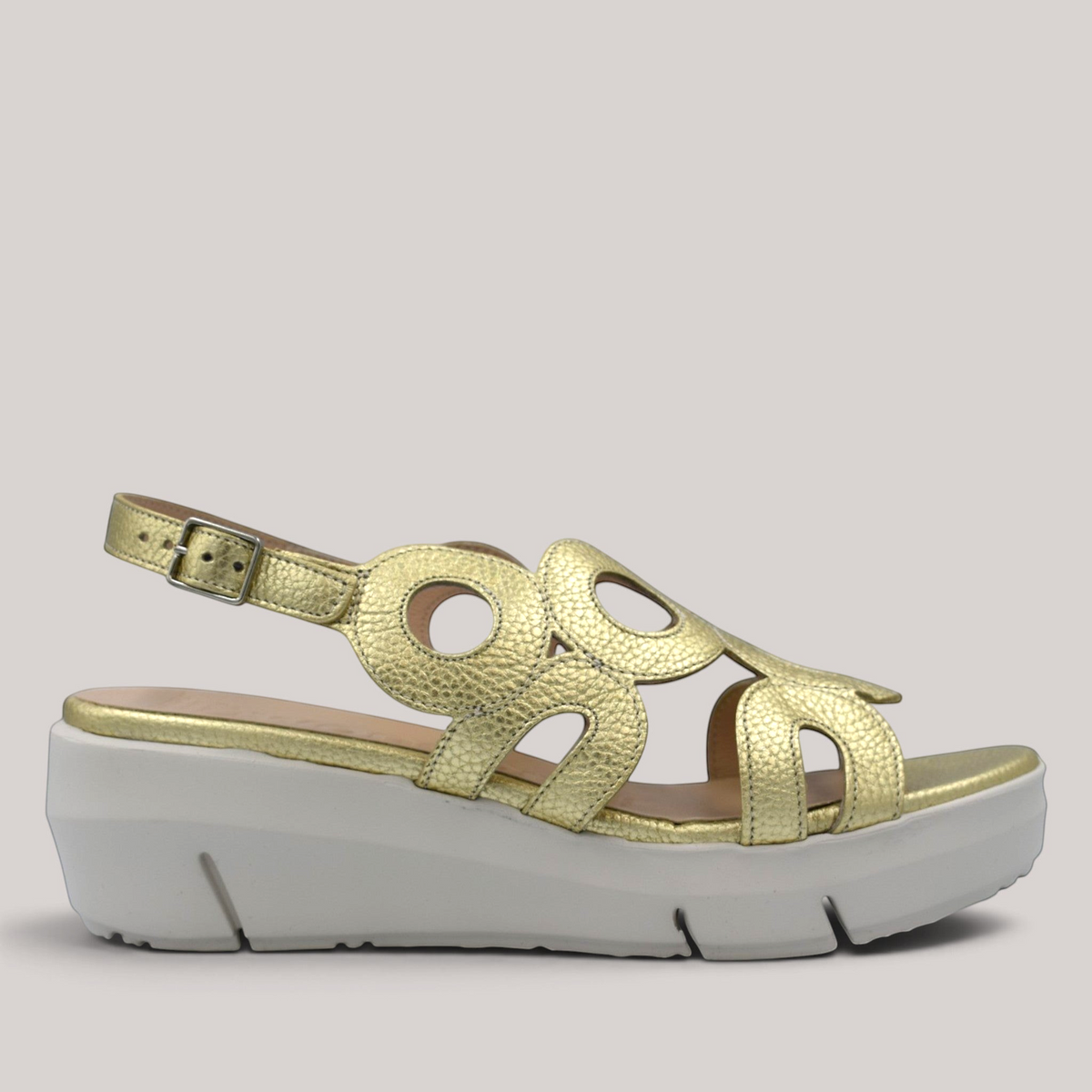 Grundy's Shoes Wonders 8282 metallic gold leather wedge sandals with circular cutouts and adjustable buckle strap