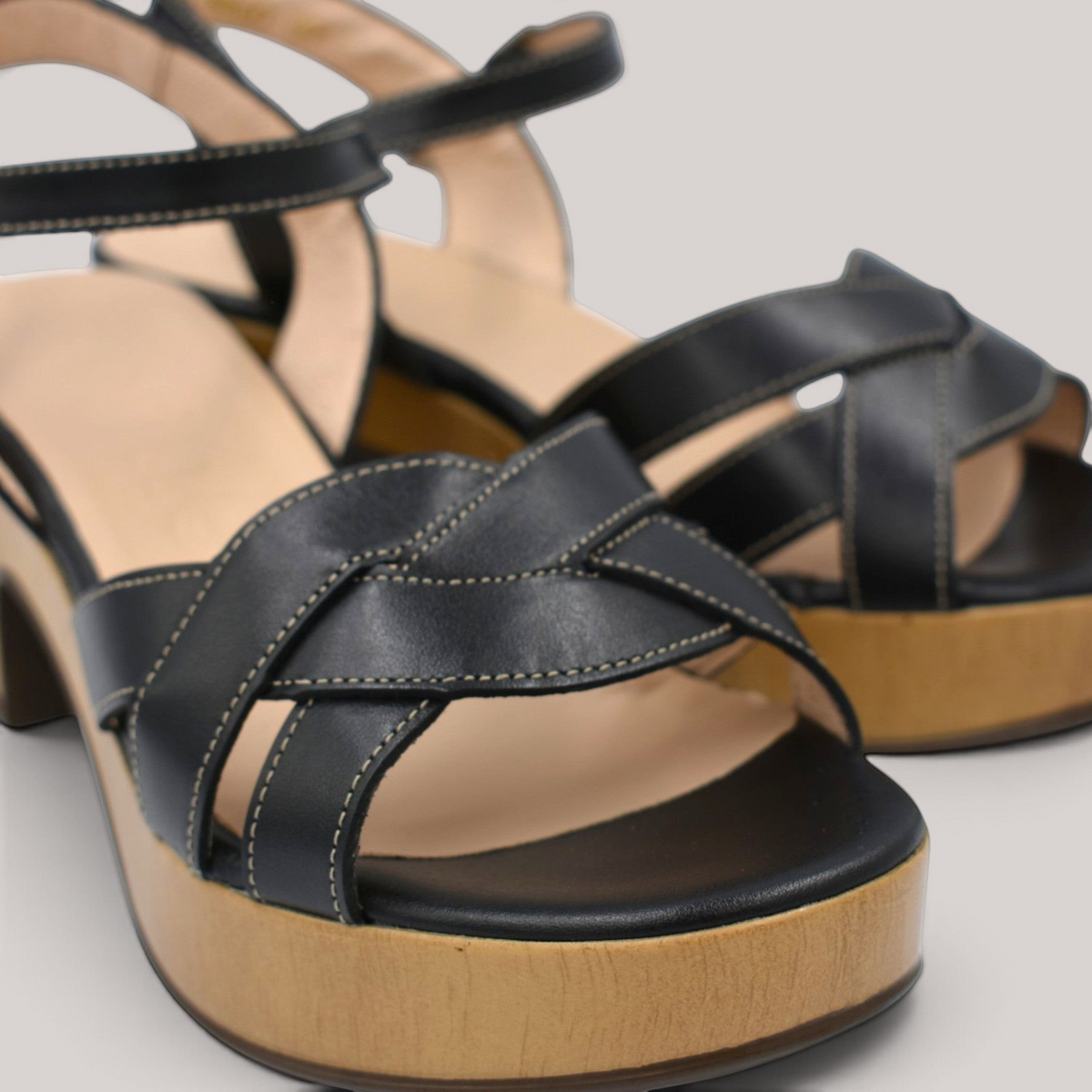 Grundy's Shoes Wonders 8860 black leather platform sandals with crossed straps and imitation wood heel