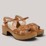 Grundy's Shoes Wonders 8860 tan leather sandals with crossed straps, adjustable buckle, and imitation wood platform heel.