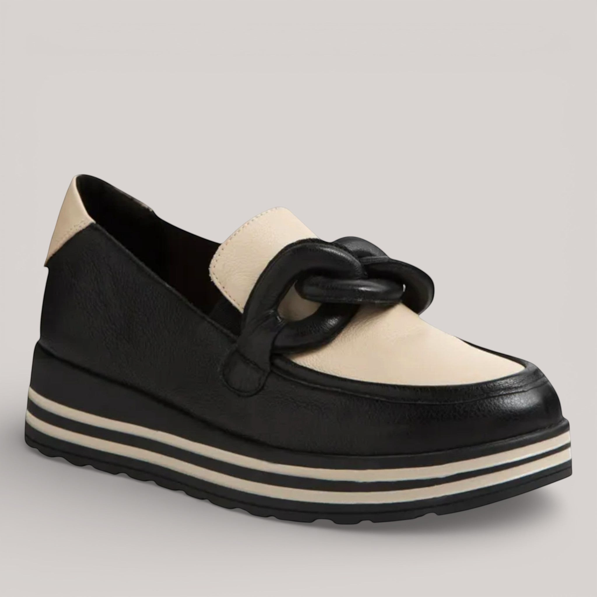 Grundy's Shoes Ziera Vyrons black and cream leather loafer with a chunky chain detail and striped platform sole.