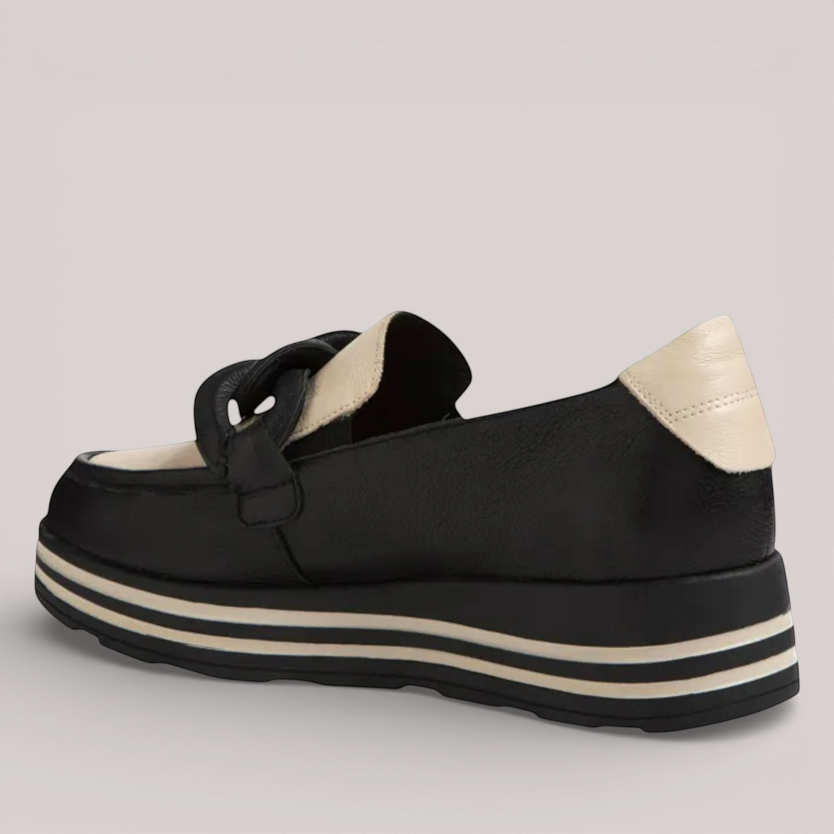 Grundy's Shoes Ziera Vyrons black and cream leather loafer with a striped platform sole and cushioned ankle collar