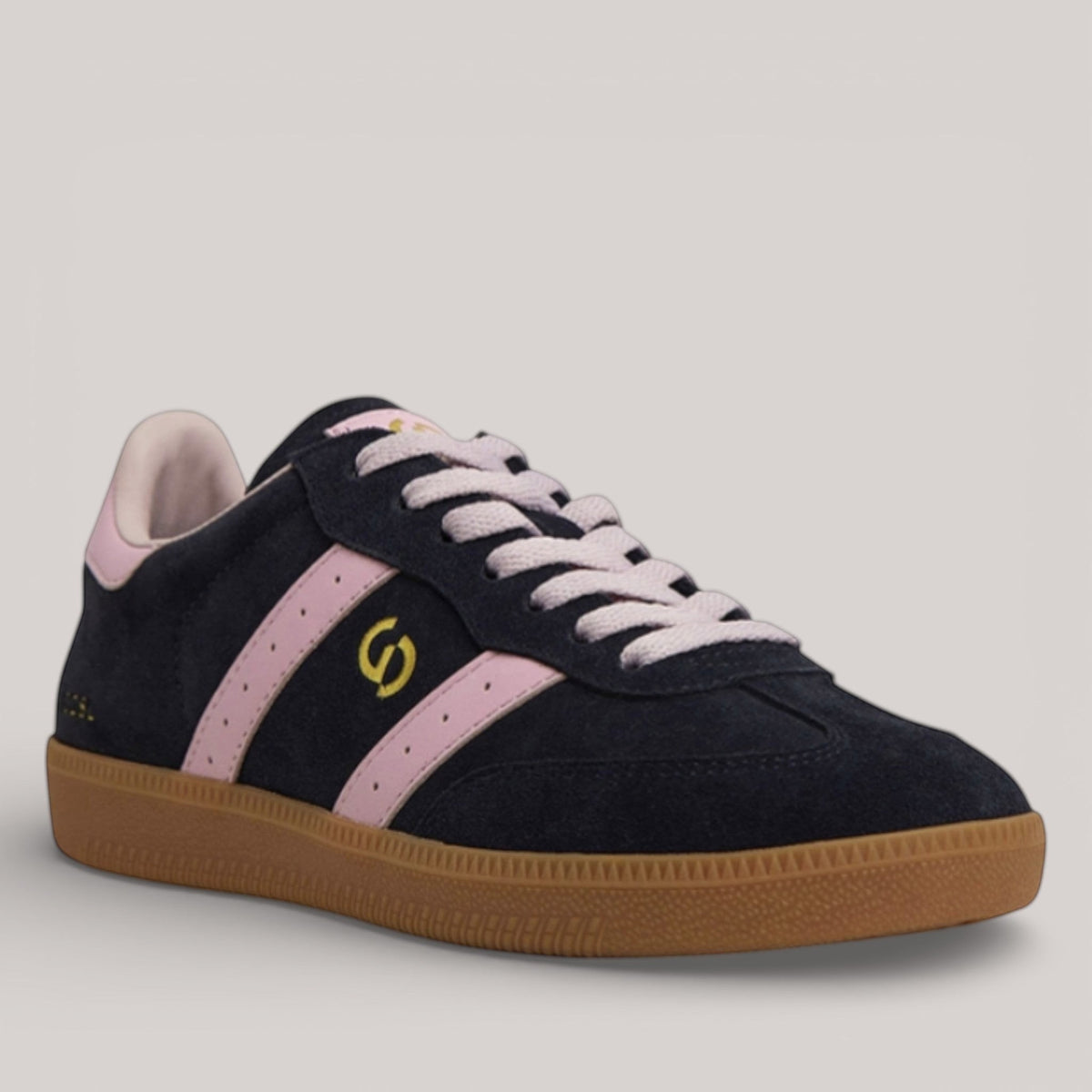 Grundy's Shoes Goodsole 2001 Parallel women's navy suede sneaker with pink leather accents and a gum rubber sole.