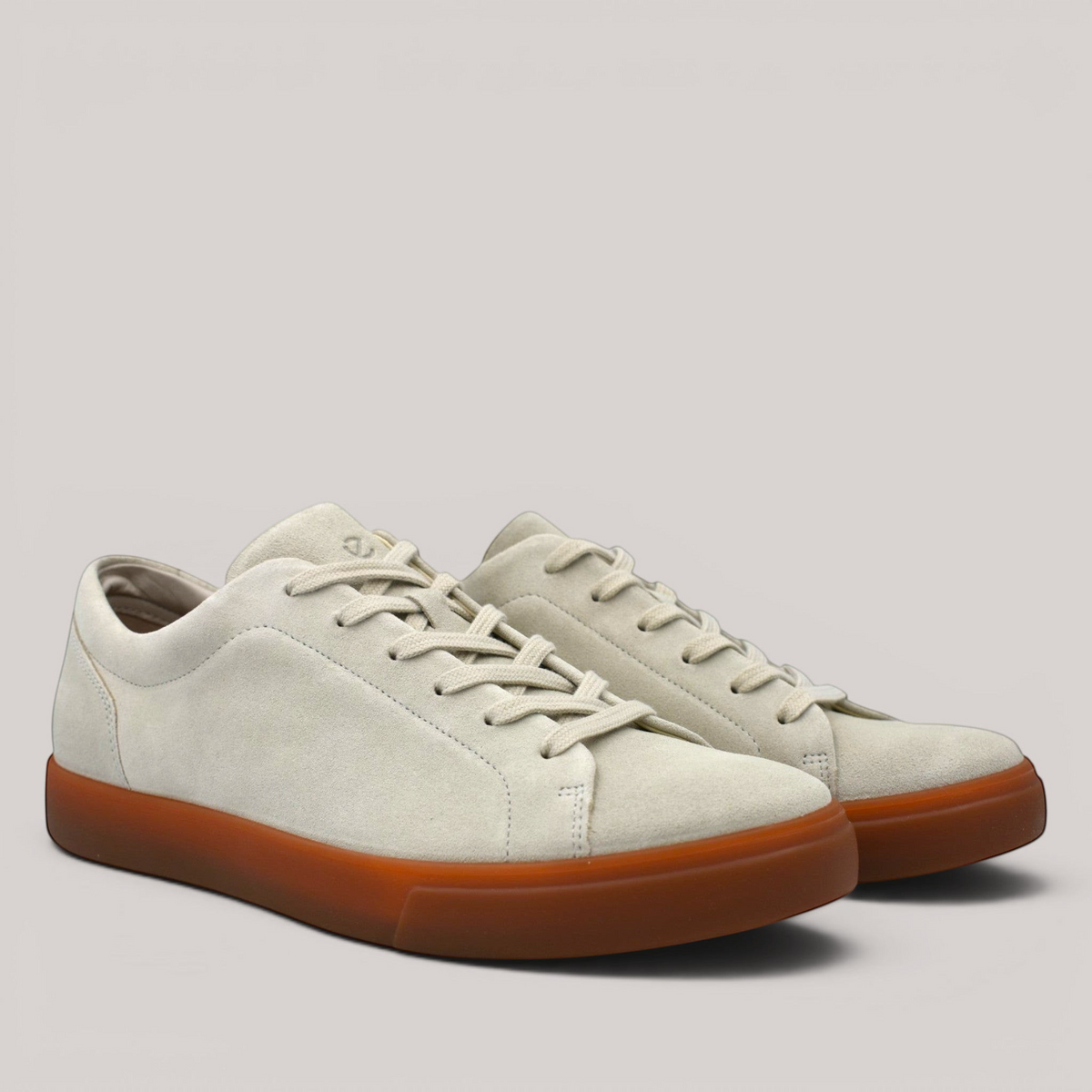Grundy's Shoes ECCO Soft 10 men's sneakers in light grey suede with a durable gum rubber sole and lace-up closure.