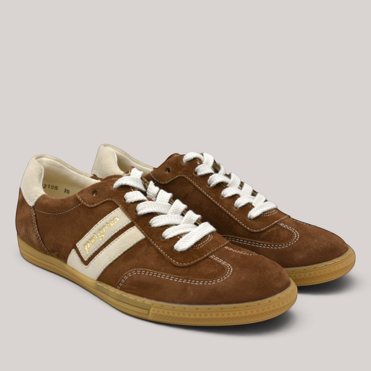 Grundy's Shoes Paul Green 5450 brown suede sneakers with white lace-up closure and gum rubber soles.