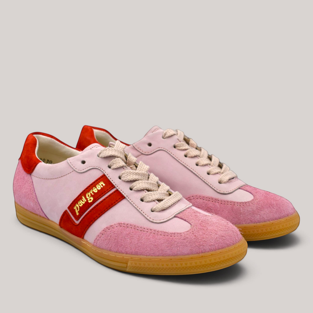 Grundy's Shoes Paul Green 5450 sneakers in pink and red suede with a gum sole and lace-up closure.
