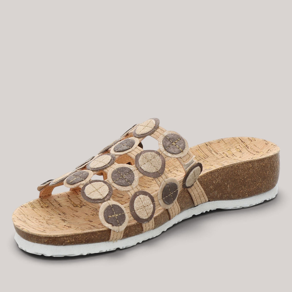 Grundy's Shoes Think 000247 leather slip-on sandal with a circular patterned upper and cork-style footbed.
