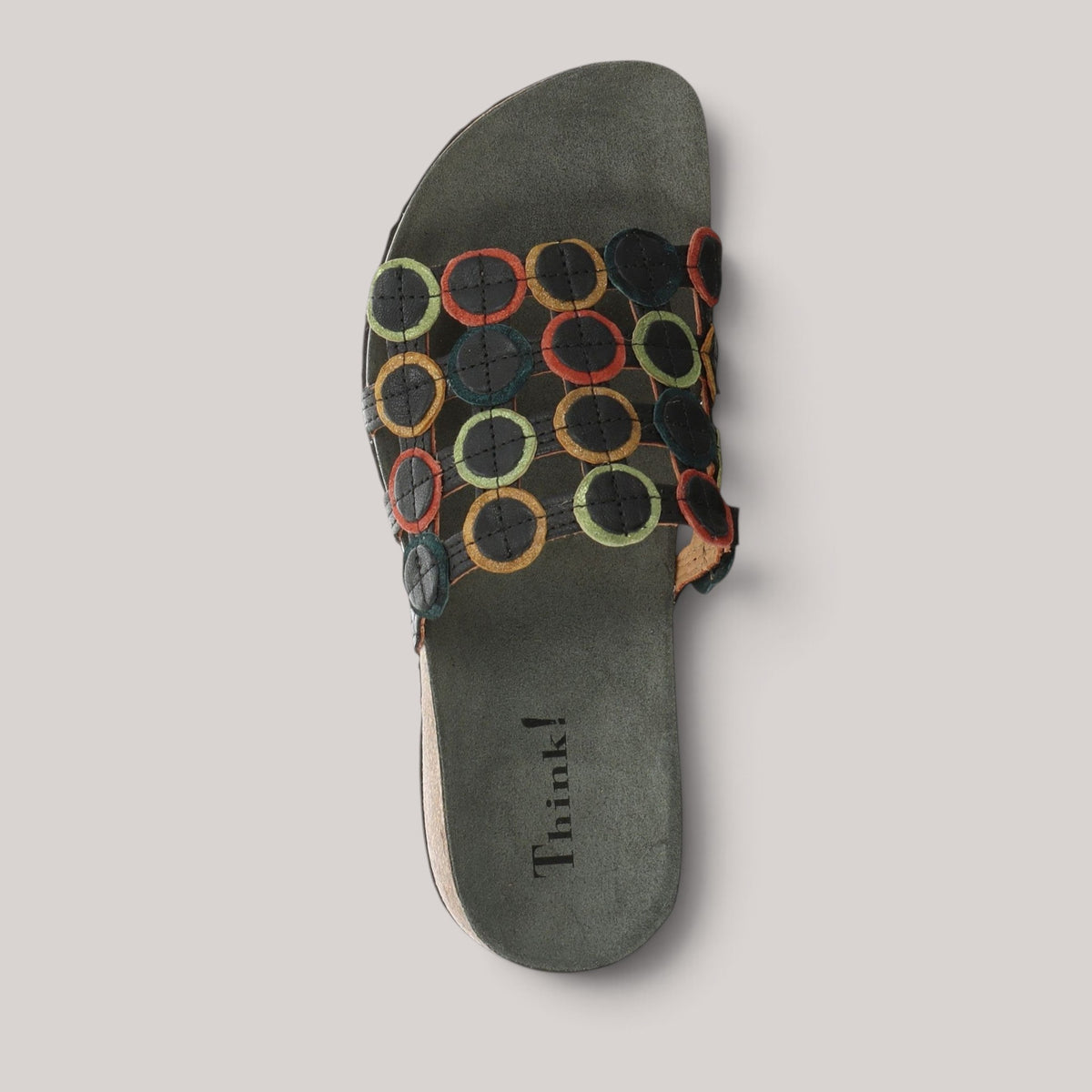 Grundy's Shoes Think 000247 leather slip-on sandal with a colourful circular pattern and arch-supporting footbed.
